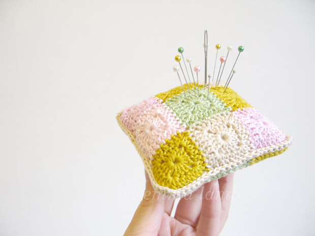 Crochet Pincushion hold by hand by Emma Lamb